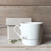 East of India Porcelain Mug | with message... Tea is a warm little hug | Wobbly mug